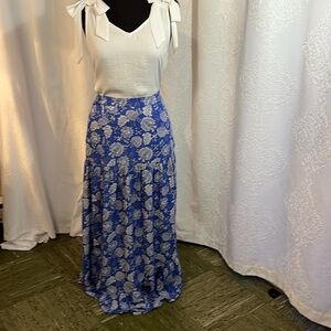 Vince Camuto true blue with white floral patter, a-symetrical hem flounce maxi.